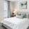Bedroom with natural lighting and high ceilingsed