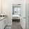 Model bathroom at our 55 and over community in Myrtle Beach, SC, featuring granite counters and a view of the bedroom.