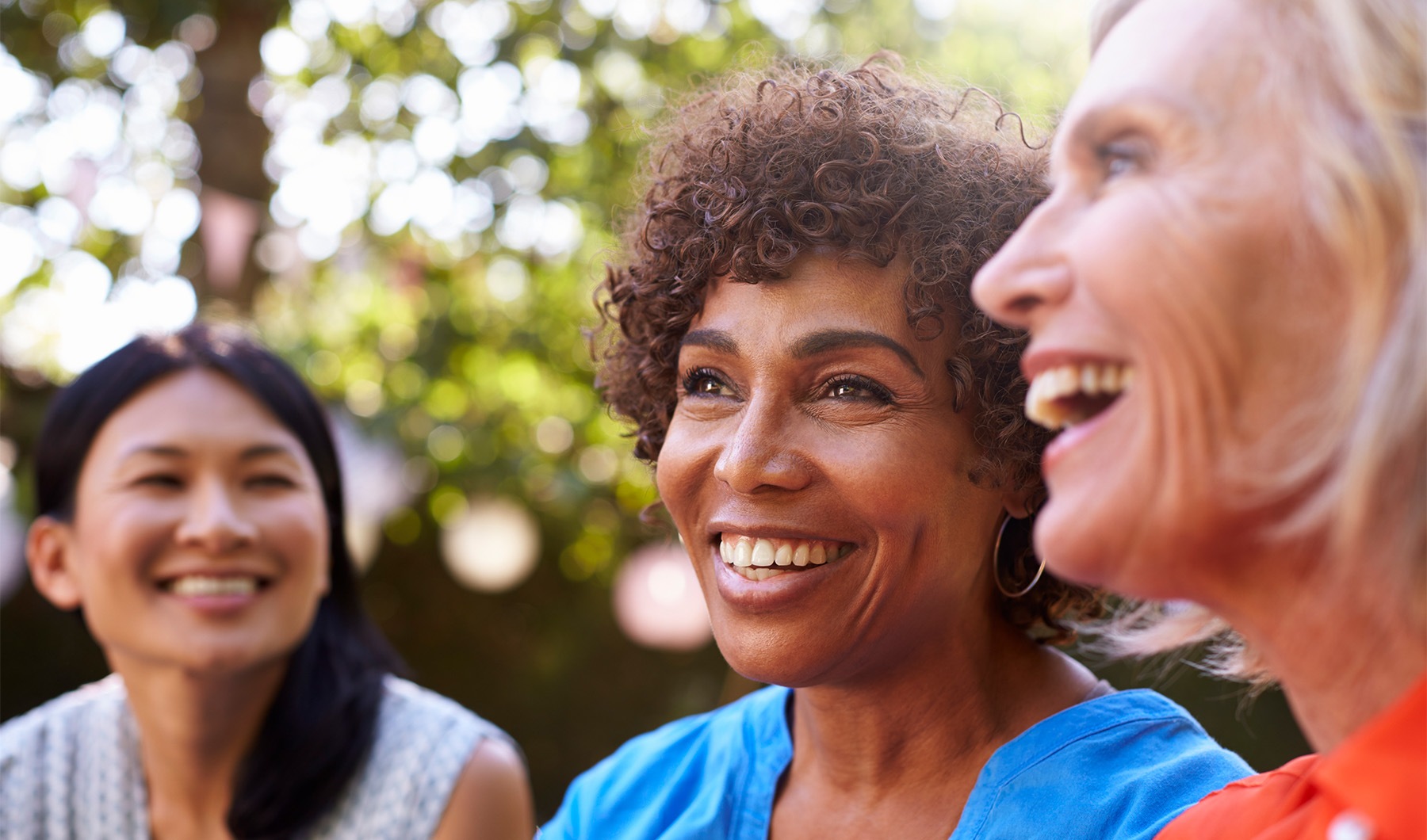 A beautiful community at the heart of all your passions three women smiling
