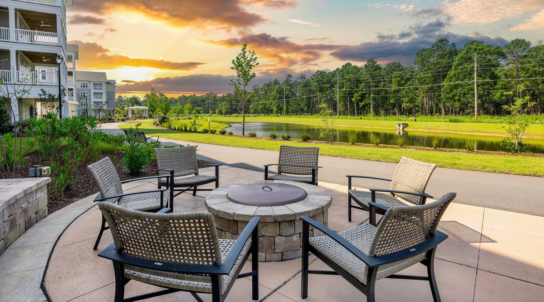 Spacious fire pit area with lounge seating Spacious fire pit area with lounge seating